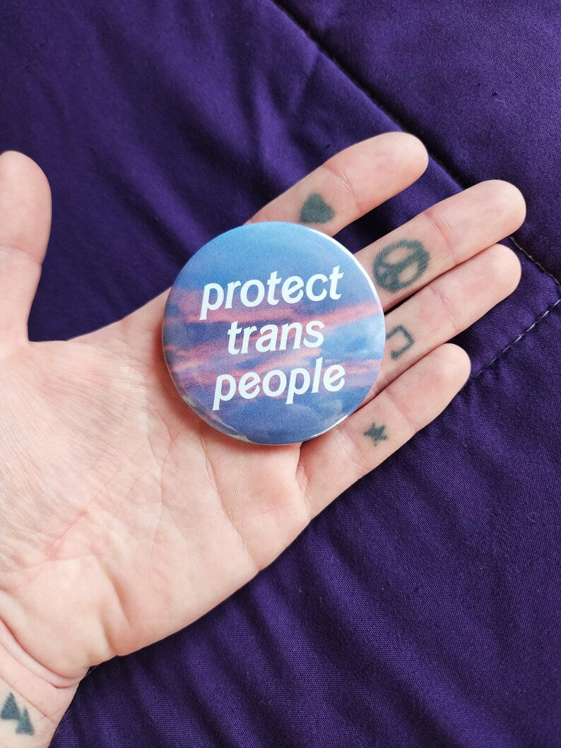 protect trans people | pin back buttons | 2.25" | sunset photography-rain faerie shop-rain faerie shop