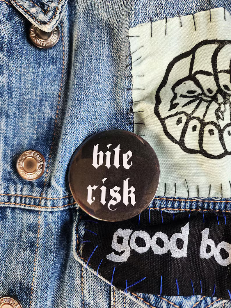 bite risk | pin back buttons | 2.25"