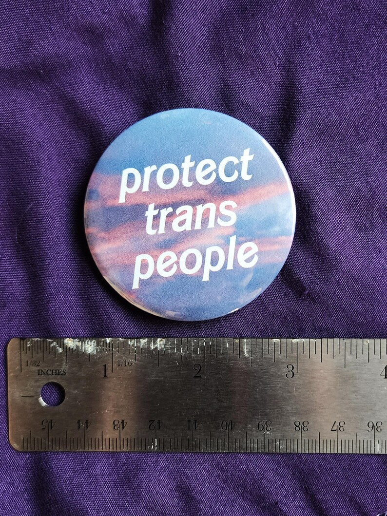 protect trans people | pin back buttons | 2.25" | sunset photography-rain faerie shop-rain faerie shop